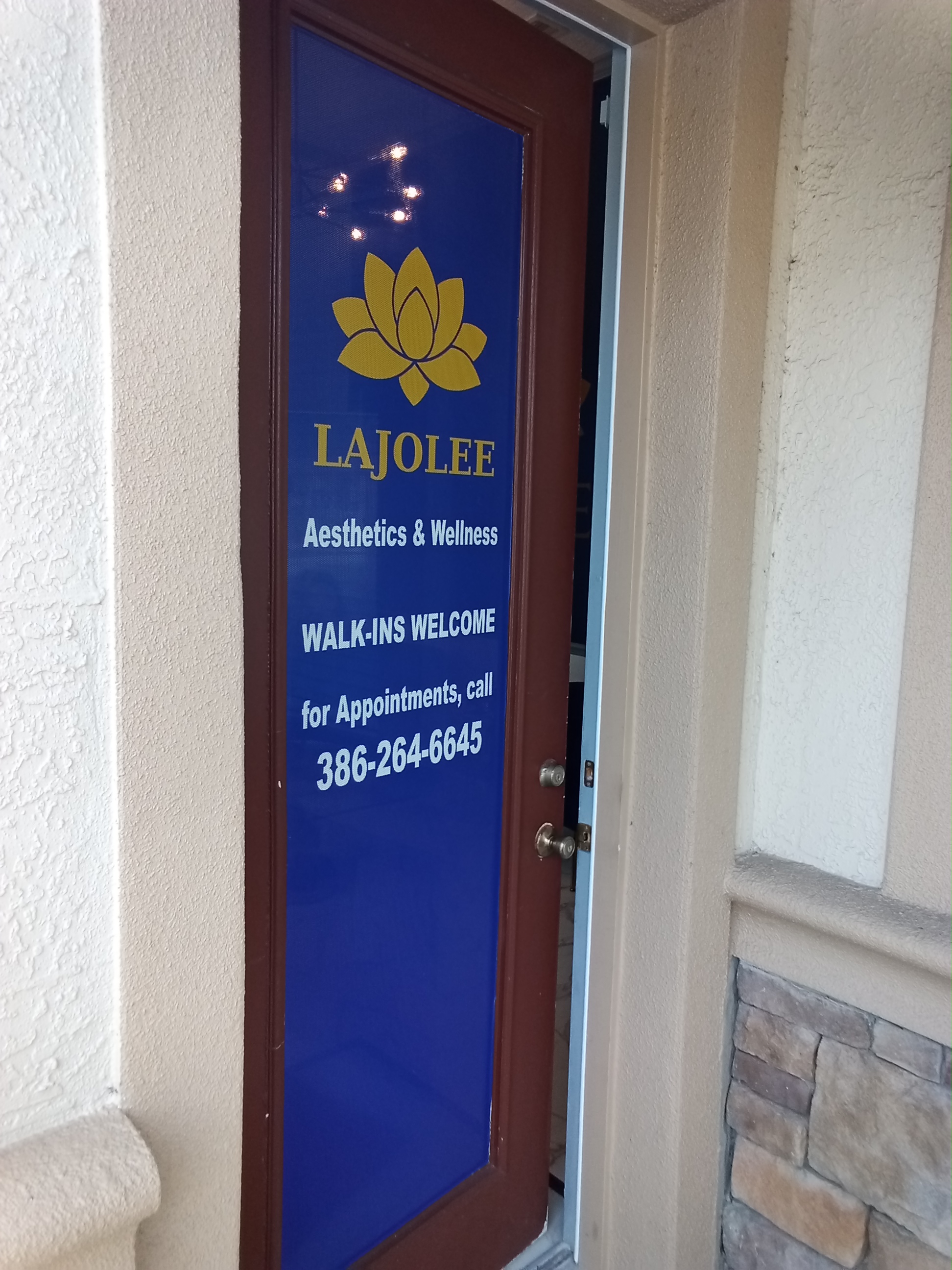 LaJolee Aesthetics entrance door with Walk-Ins Welcome sign