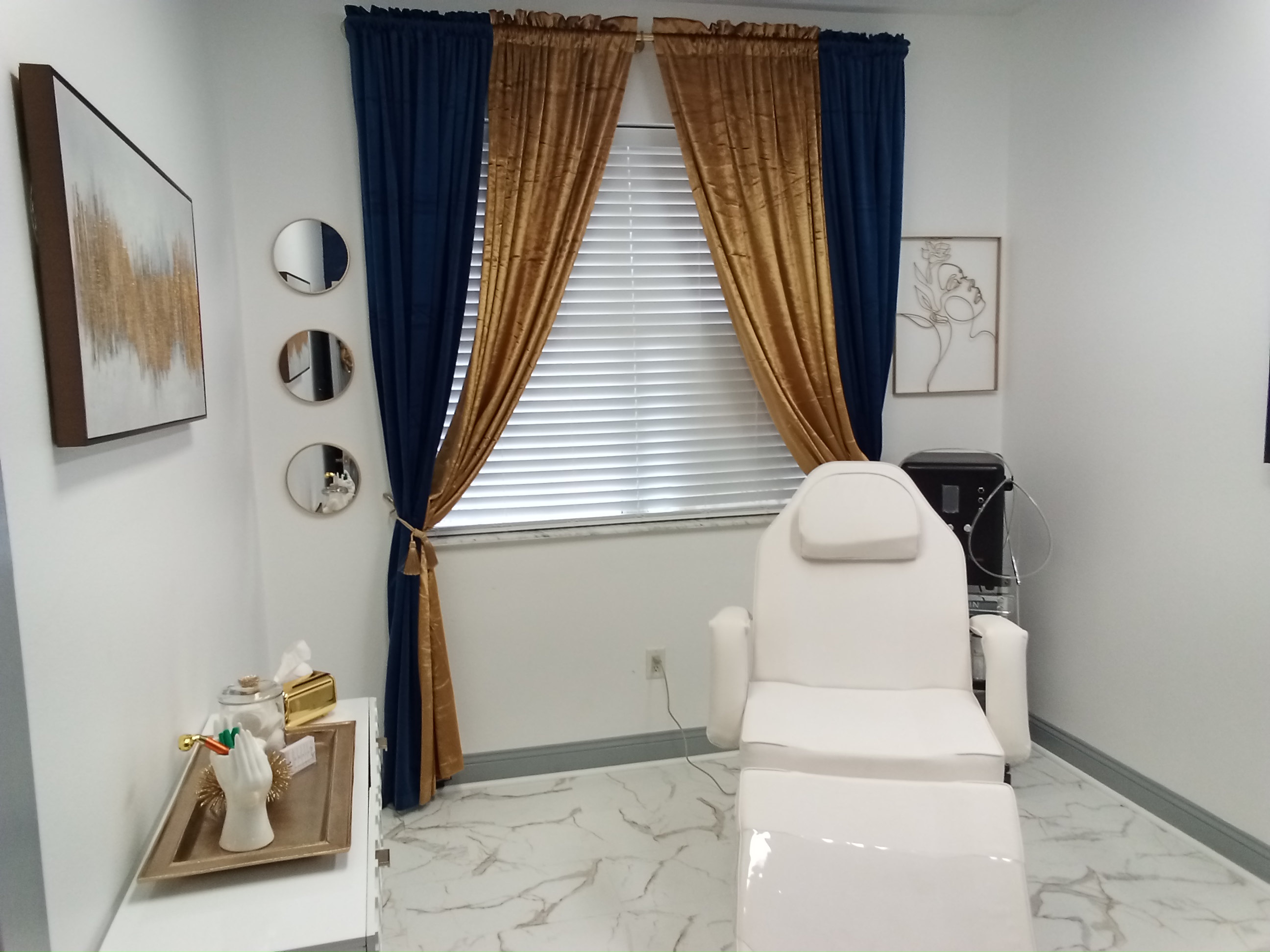 Professional treatment room with medical-grade equipment and elegant decor